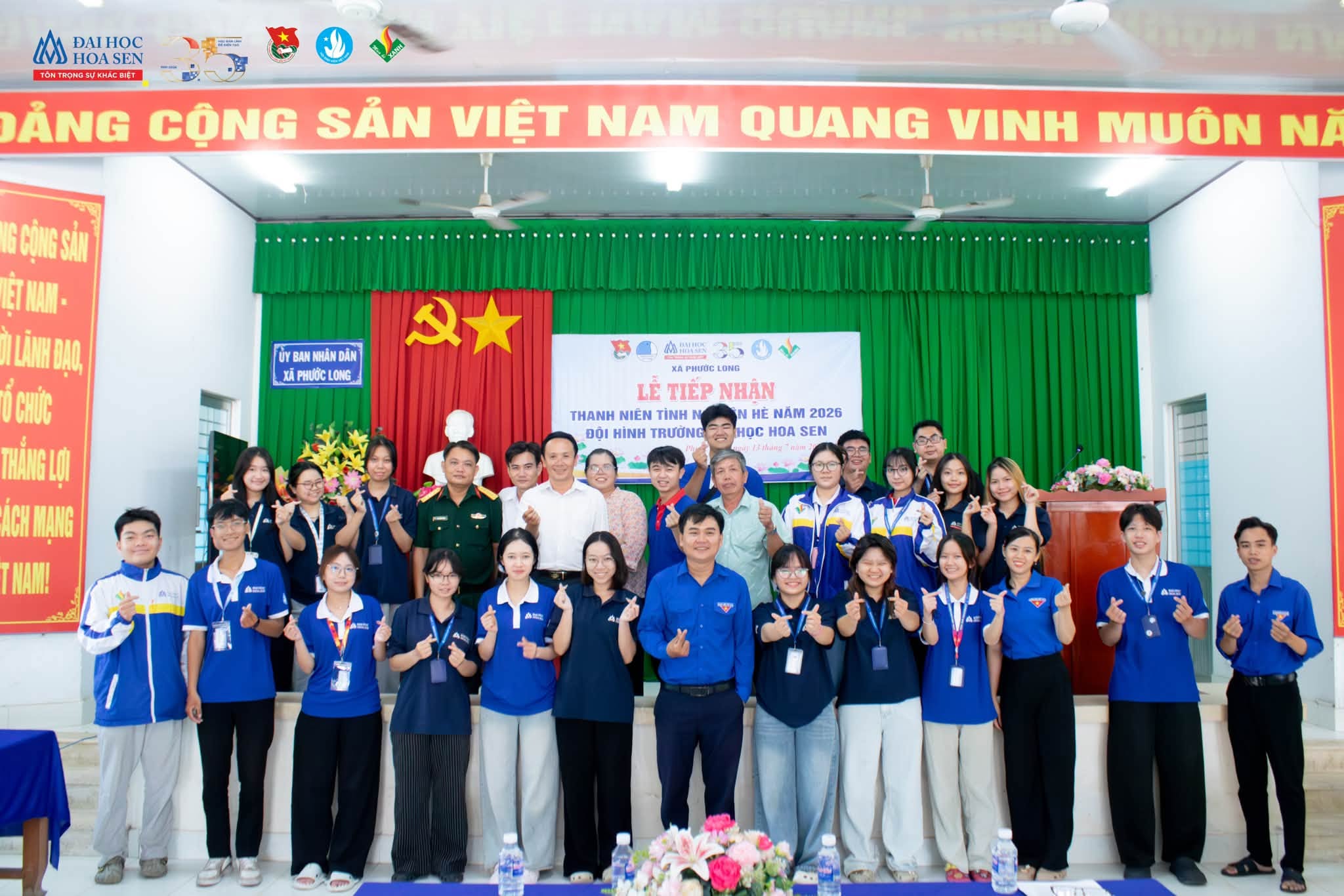 LỄ TIẾP NHẬN THANH NIÊN TÌNH NGUYỆN HÈ 2026 ĐỘI HÌNH TRƯỜNG ĐẠI HỌC HOA SEN
